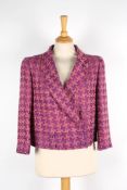 Two Chanel boucle jackets the first with purple and pink check, double breasted, two pockets to