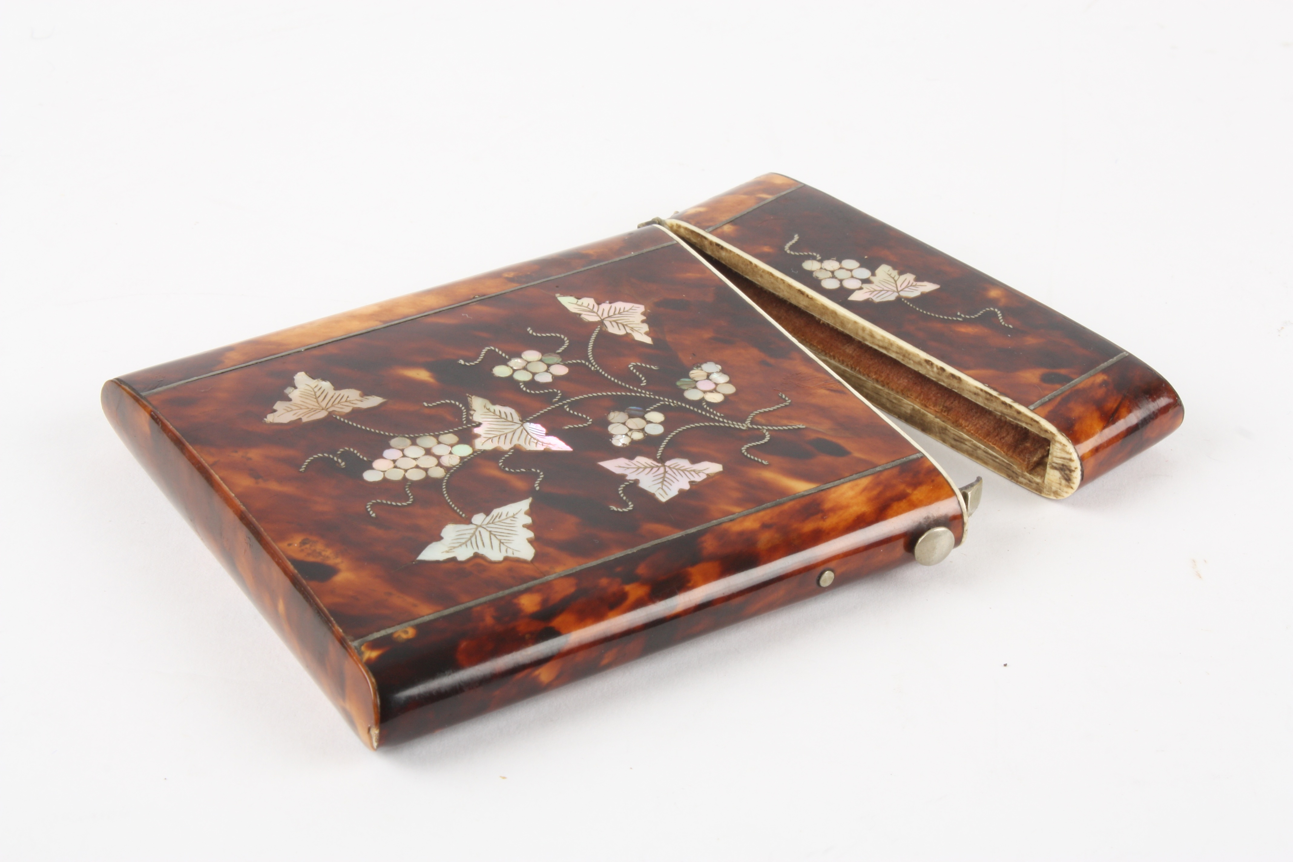 A Victorian tortoiseshell and mother of pearl card case
inlaid with grapes and vines on both sides - Image 3 of 3