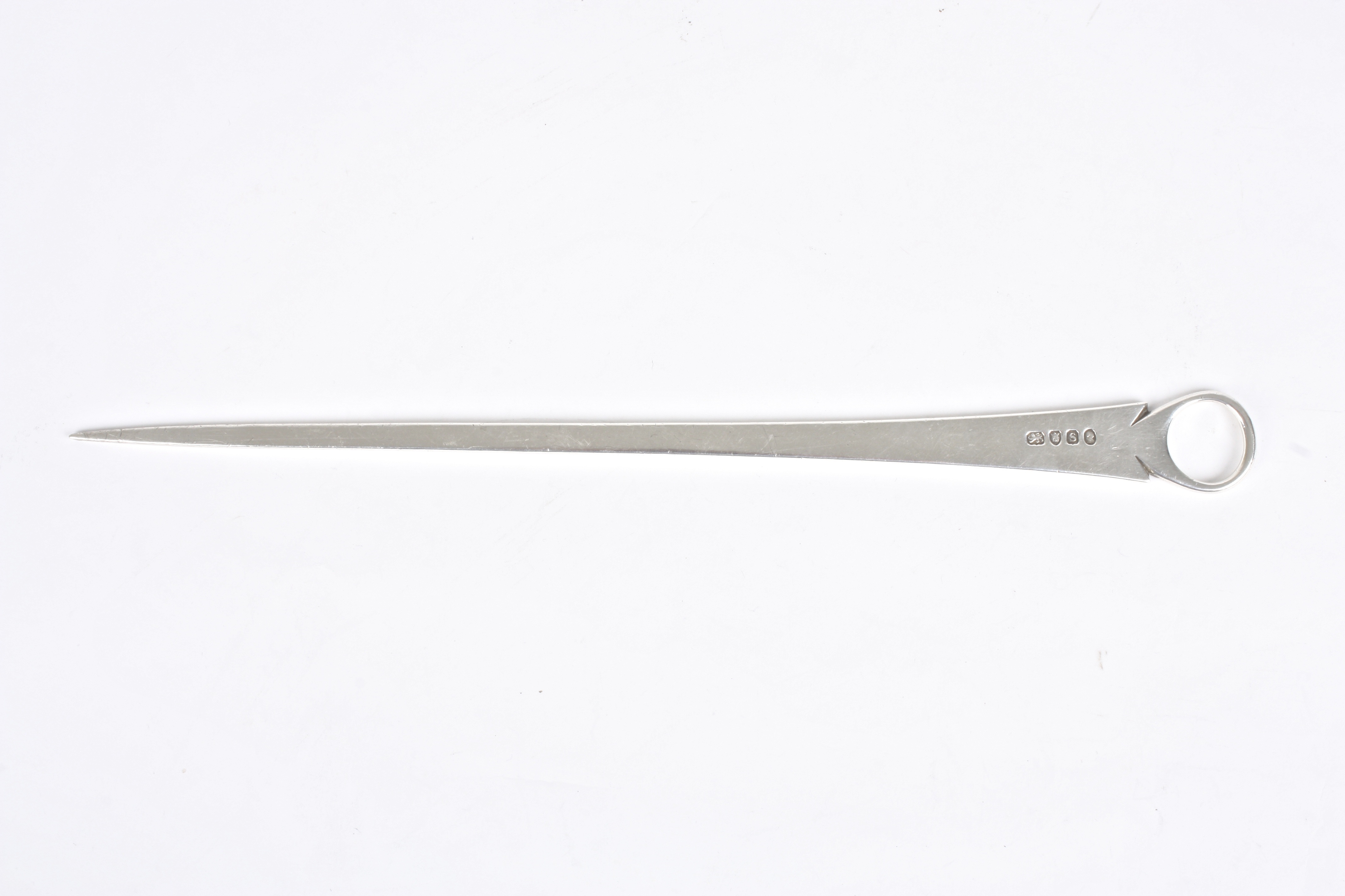 A George III silver meat skewer
hallmarked London 1813, of plain form with loop handle.Dimensions: