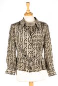 A collection of Chanel blousesthe first brown and black patterned vest top and matching blouse, the