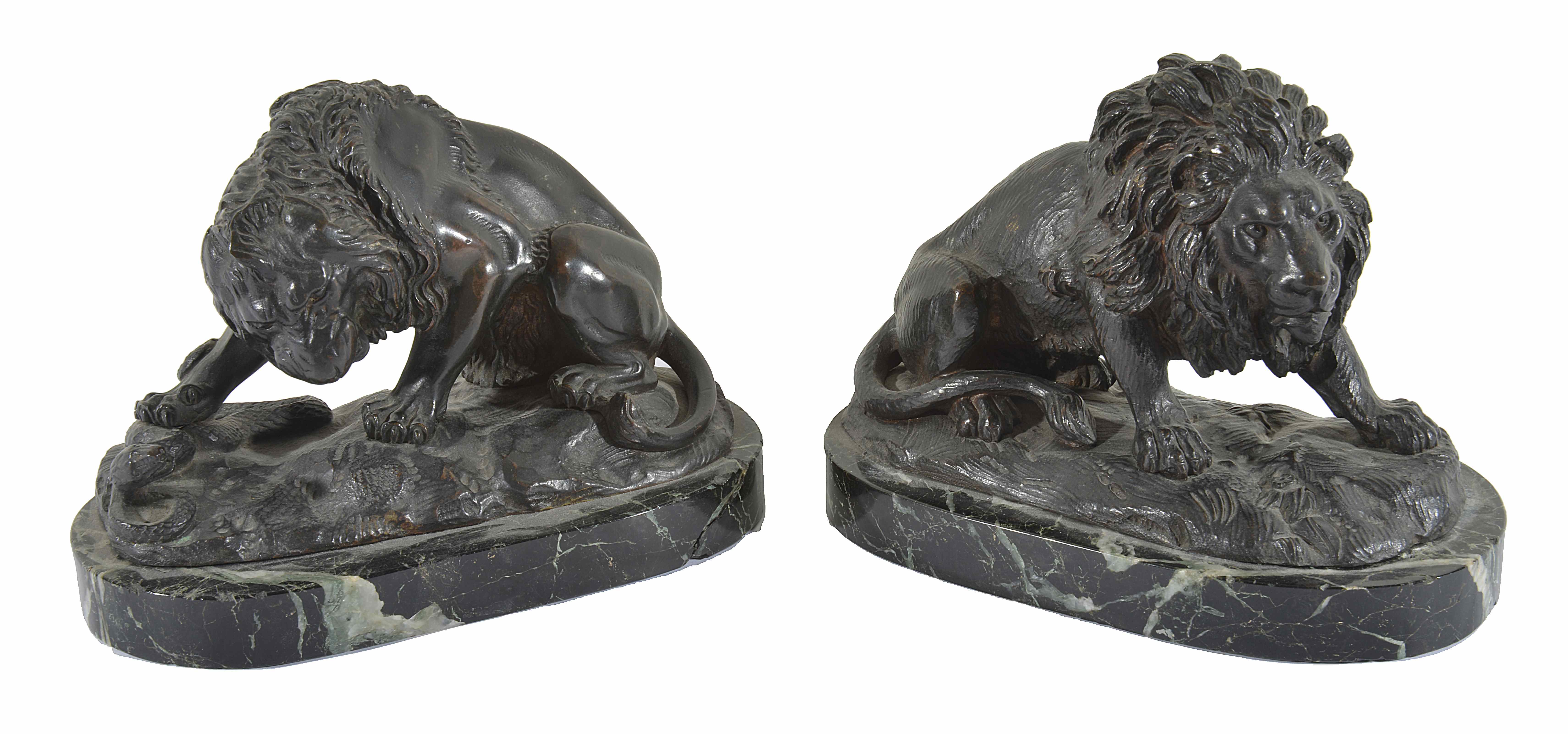 Two bronze lions probably French, late 19th century both in crouching poses, naturalistically