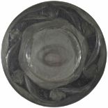 An Arts and Craft charger
with stylised raised flowersDimensions: diameter 54cmCondition