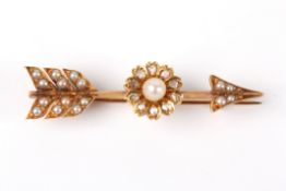 A Victorian diamond and seed pearl bar broochin the form of an arrow, the shaft set with a pearl