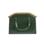 A Deco dark green leather ladies hand bag
with snap fasteningDimensions: width 23.5cmCondition