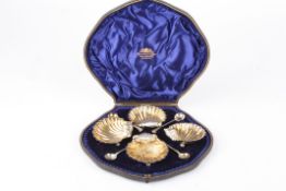 A set of six Victorian silver gilt shell shaped salts hallmarked London 1895, together with matching