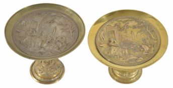 Two gilt brass repoussé tazzasof classical design, both with design of Classical architecture and