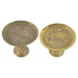 Two gilt brass repoussé tazzas
of classical design, both with design of Classical architecture and