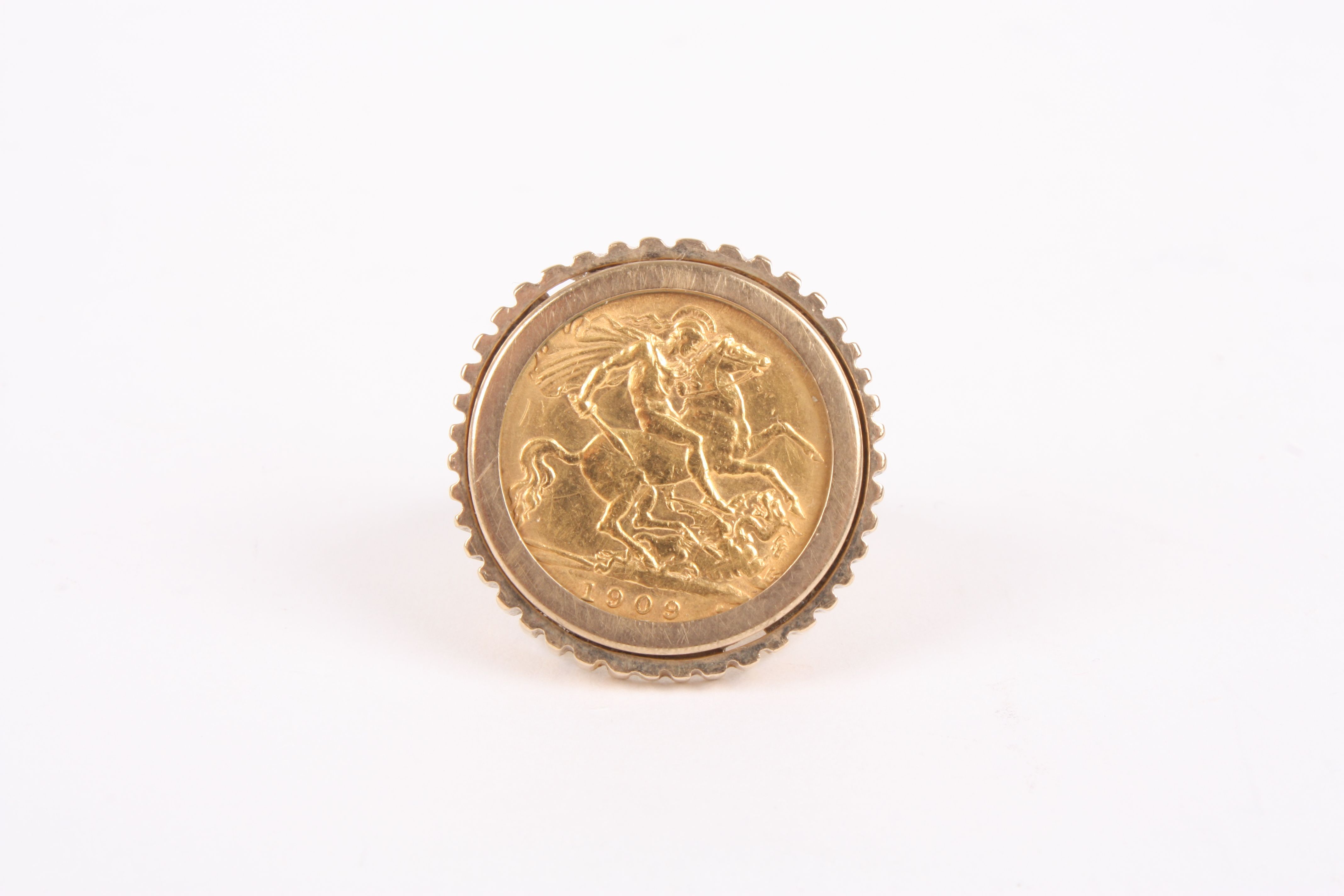 A sovereign ring
dated 1909, mounted on a 9ct shankDimensions: Condition reportGood condition
