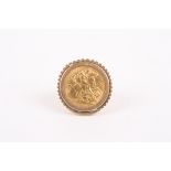 A sovereign ring
dated 1909, mounted on a 9ct shankDimensions: Condition reportGood condition