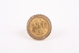 A sovereign ringdated 1909, mounted on a 9ct shankDimensions: Condition reportGood condition