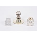 An Edwardian silver capstan inkwell 
hallmarked Birmingham 1908; together with a silver and glass