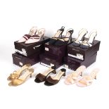 A collection of six pairs of Jimmy Choo shoes. 
including one pair of brand new navy strappy evening