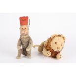 A Steiff plush mohair stuffed toy lion
in standing pose with articulated head and legs and glass