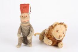 A Steiff plush mohair stuffed toy lionin standing pose with articulated head and legs and glass