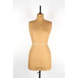 A Yugin & Sons Ltd tailors mannequin
size 16, with cloth covered body, stamped Yugin, with