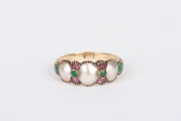 A 19th century mother of pearl, tourmaline and emerald ring of suffragette coloursset with three