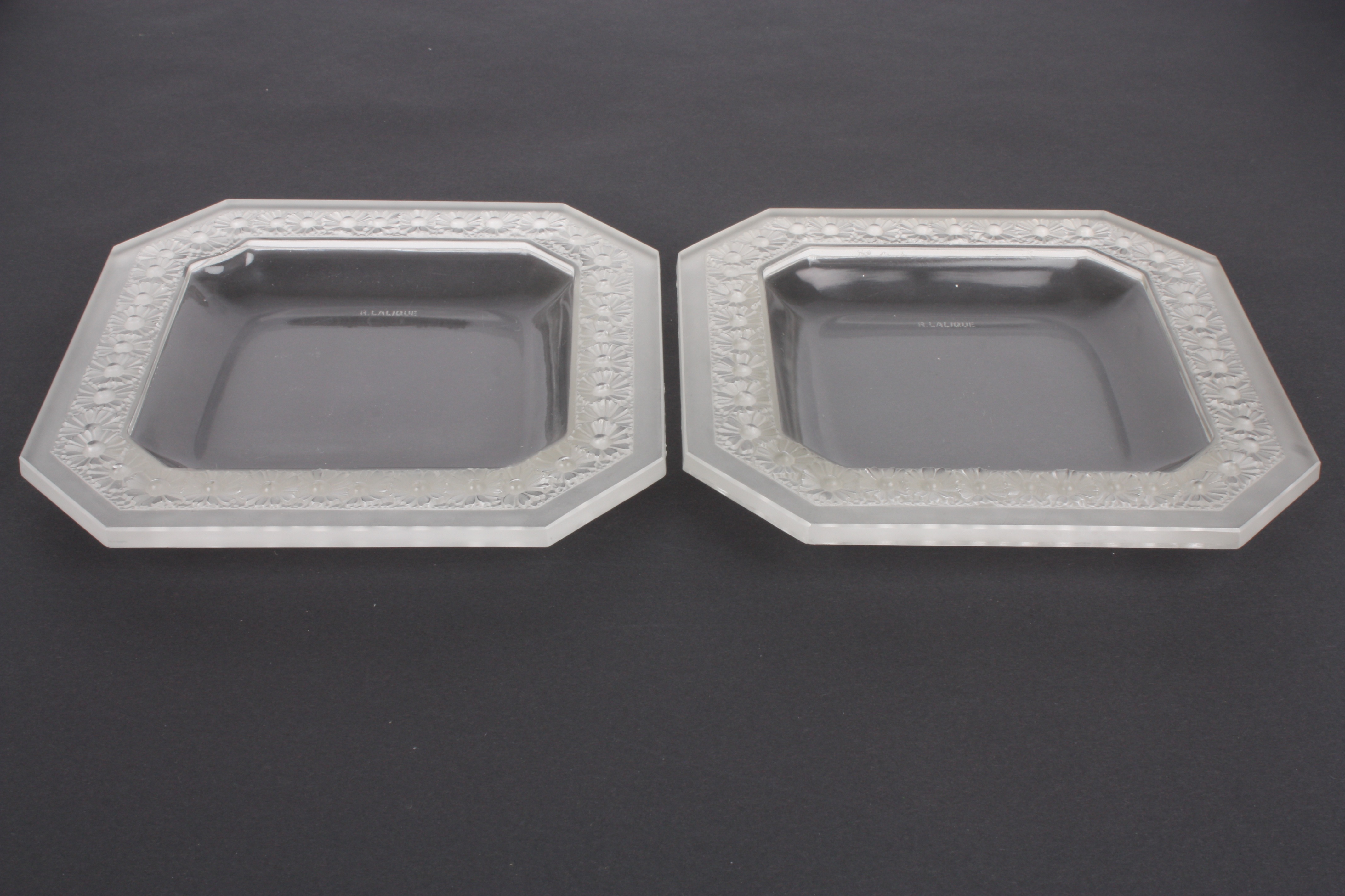 A pair of R. Lalique 'Paquerettes' square frosted glass dishes
the rims moulded with daisies, with - Image 2 of 2
