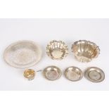 A collection of Continental silver and white metal
including an oval and circular lobed petal
