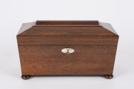 A 19th century sarcophagus shaped rosewood tea caddythe interior with glass mixing bowl and twin