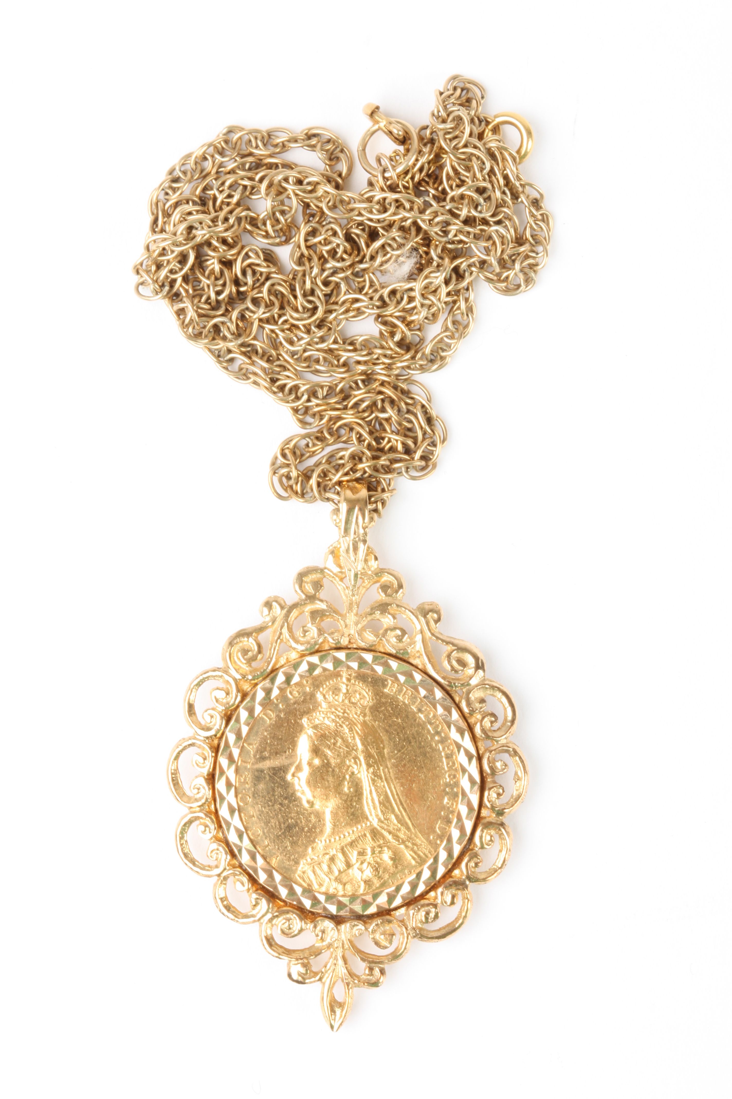 A Victorian 1889 22ct gold full sovereign
in an ornate foliate 9ct gold mount, on a 9ct gold chain. - Image 2 of 2