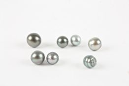 A small collection of Tahitian black pearlsincluding some baroque pearls, (7)Dimensions: the