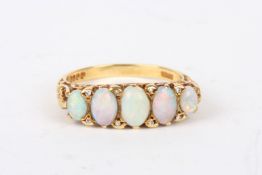 An 18ct gold, opal and diamond five stone ringthe five oval opals interspersed with diamond points,