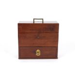 An early 19th century mahogany travelling medicine box
the hinged top opening to reveal bottles