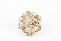 A Swedish Stigbert silver flower ringformed as stylised petals on a looped shank, signed the