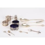 A collection of assorted silverware
including a matched silver cruet set with blue glass liners, a