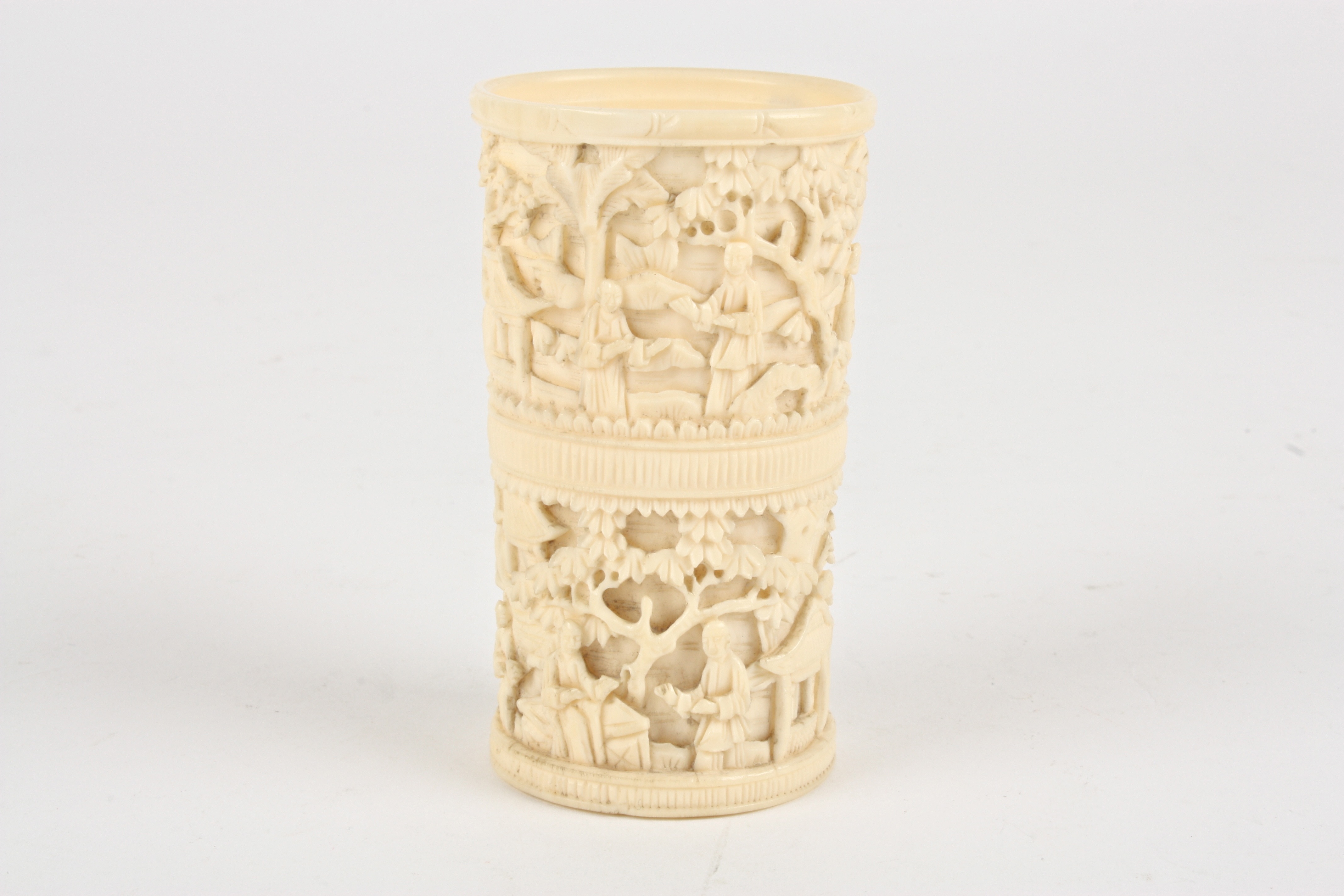 A late 19th / early 20th Chinese Canton carved ivory dice cup
decorated with two bands of scenes - Image 2 of 3