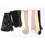 A collection of nine pairs of leather, satin and suede ladies evening gloves.Dimensions: Condition