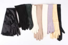 A collection of nine pairs of leather, satin and suede ladies evening gloves.Dimensions: Condition