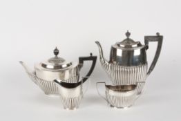 A contemporary silver four piece tea and coffee sethallmarked Sheffield 1992, formed with