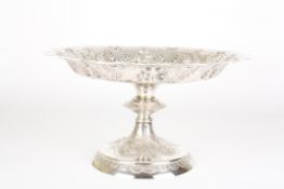 A large Victorian silver salverhallmarked Sheffield 1892, the top with shaped rim, and embossed and