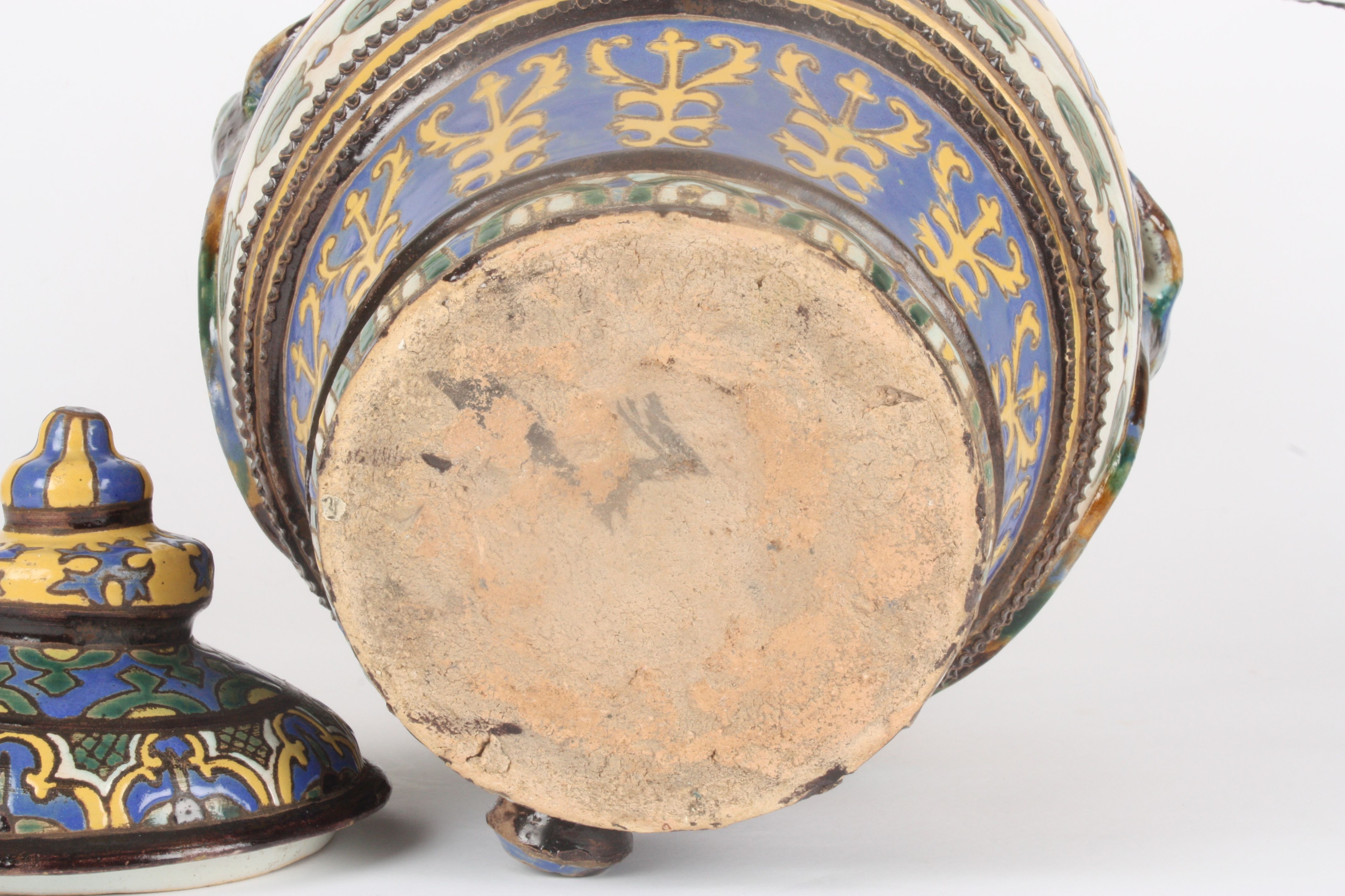 A large Persian pottery water butt and cover
naively potted and decorated in bright enamel colours - Image 6 of 6