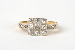 An Art Deco style 18ct gold and diamond ringthe square mount set with nine small diamonds and