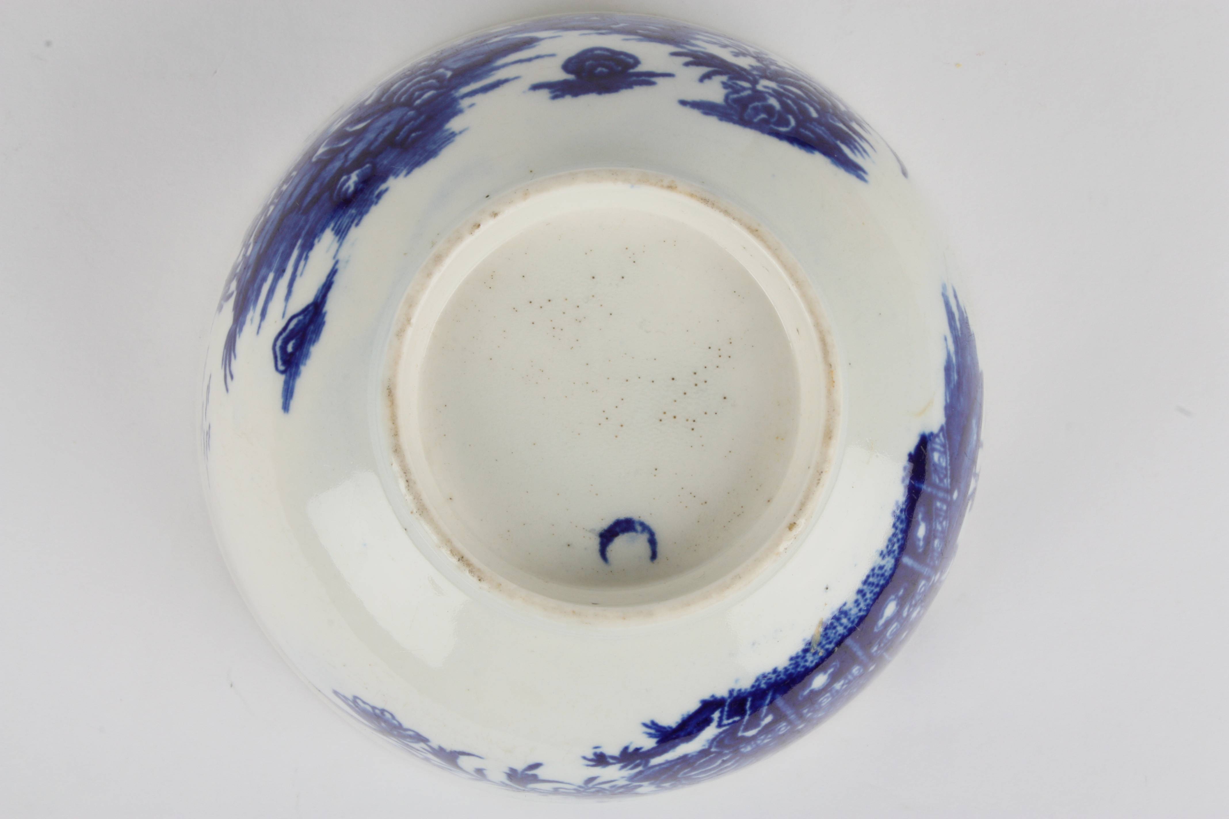 A late 18th century Worcester transfer printed blue and white bowl
decorated in the Fisherman and - Image 3 of 4