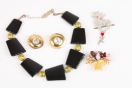 A collection of Butler & Wilson costume jewelleryincluding a cat brooch, chunky necklace, pair of