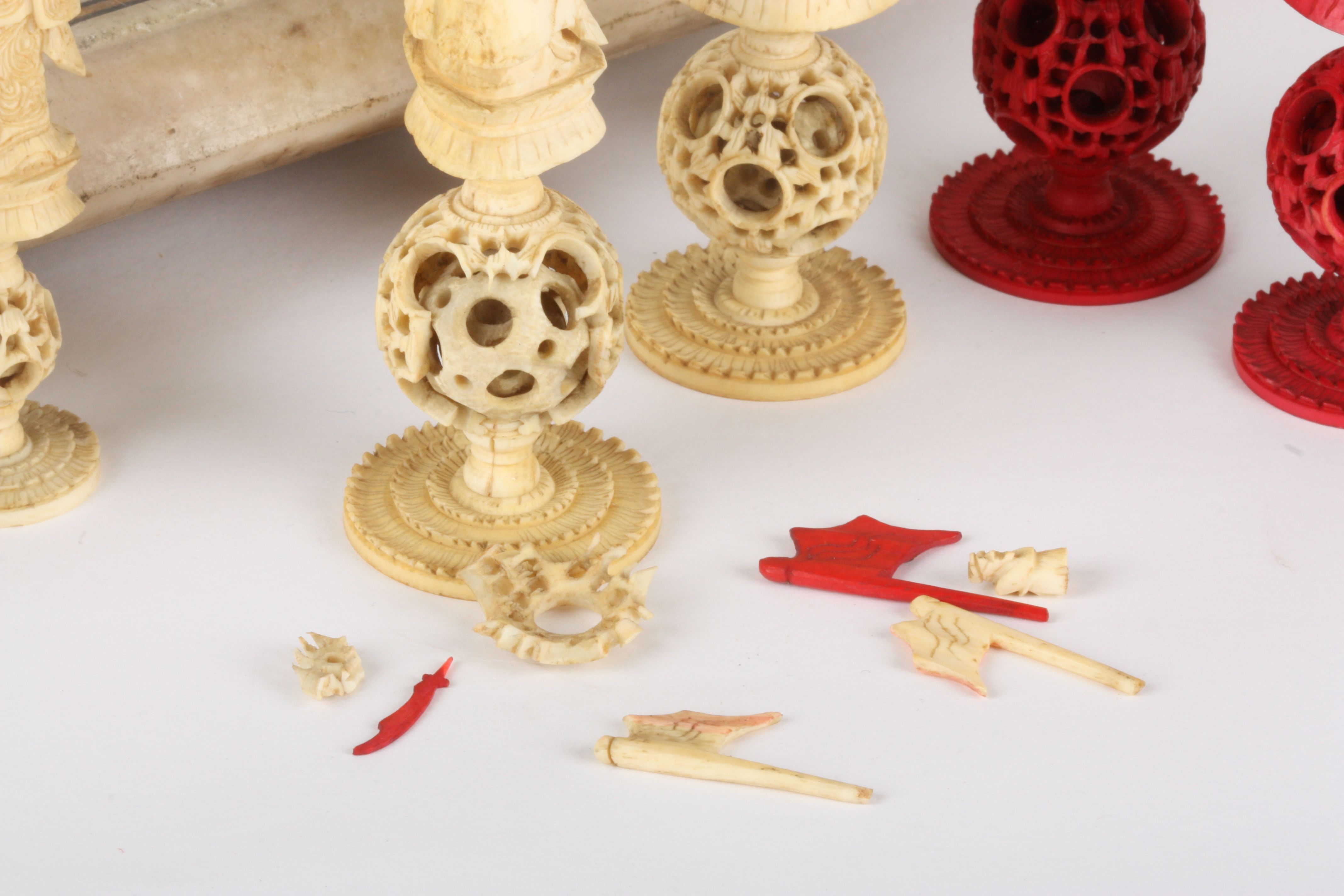 A Chinese carved ivory 'puzzle ball' figural chess set
Canton, early 19th century
one side of the - Image 5 of 6