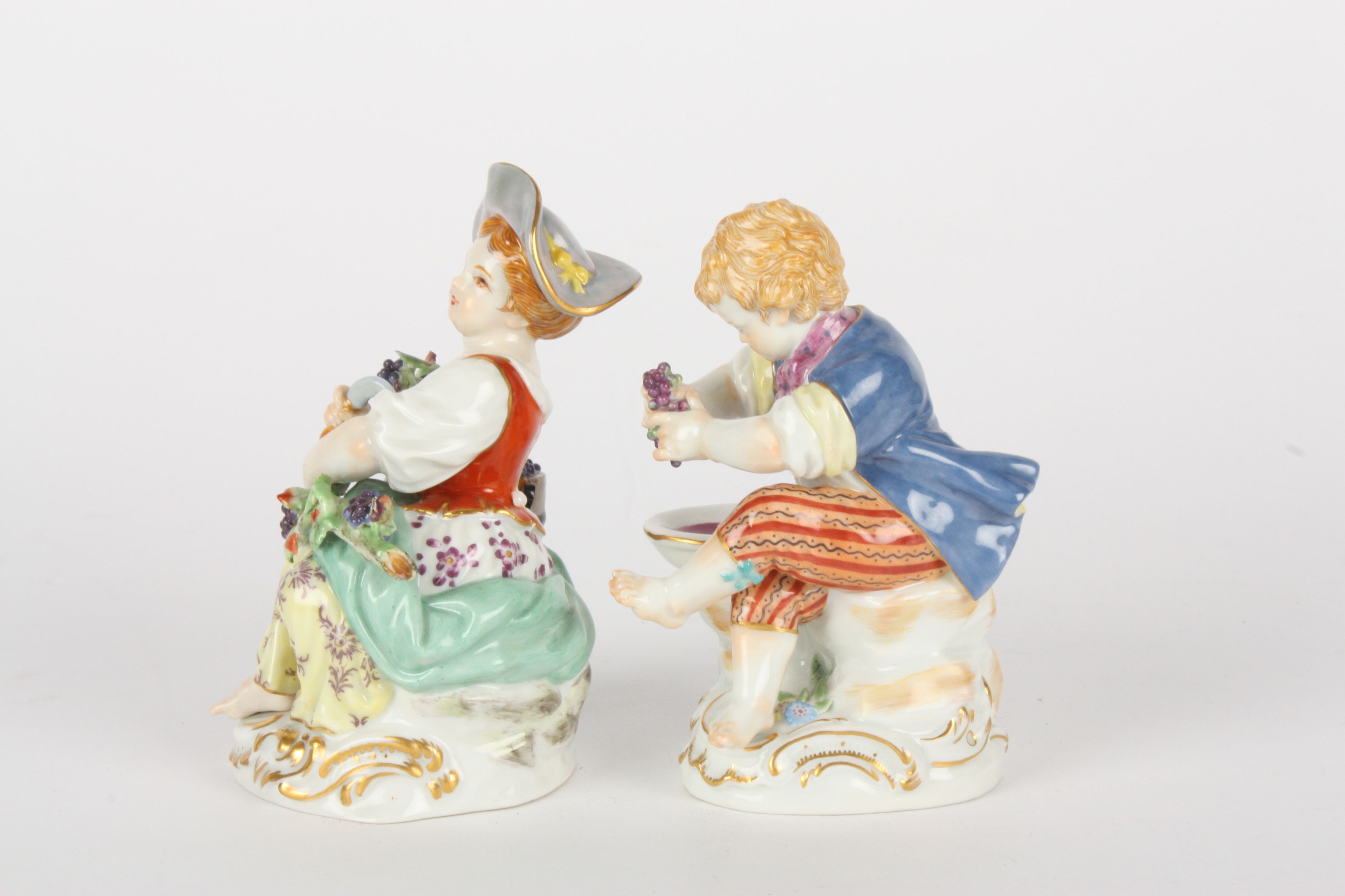 Pair of late 20th century Meissen gardener boy and girl, each modelled seated, girl with basket of - Image 3 of 5
