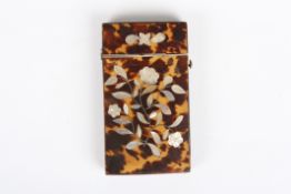 A Victorian tortoiseshell calling card caseinlaid with mother of pearl flowers on both sides, 9 x 5