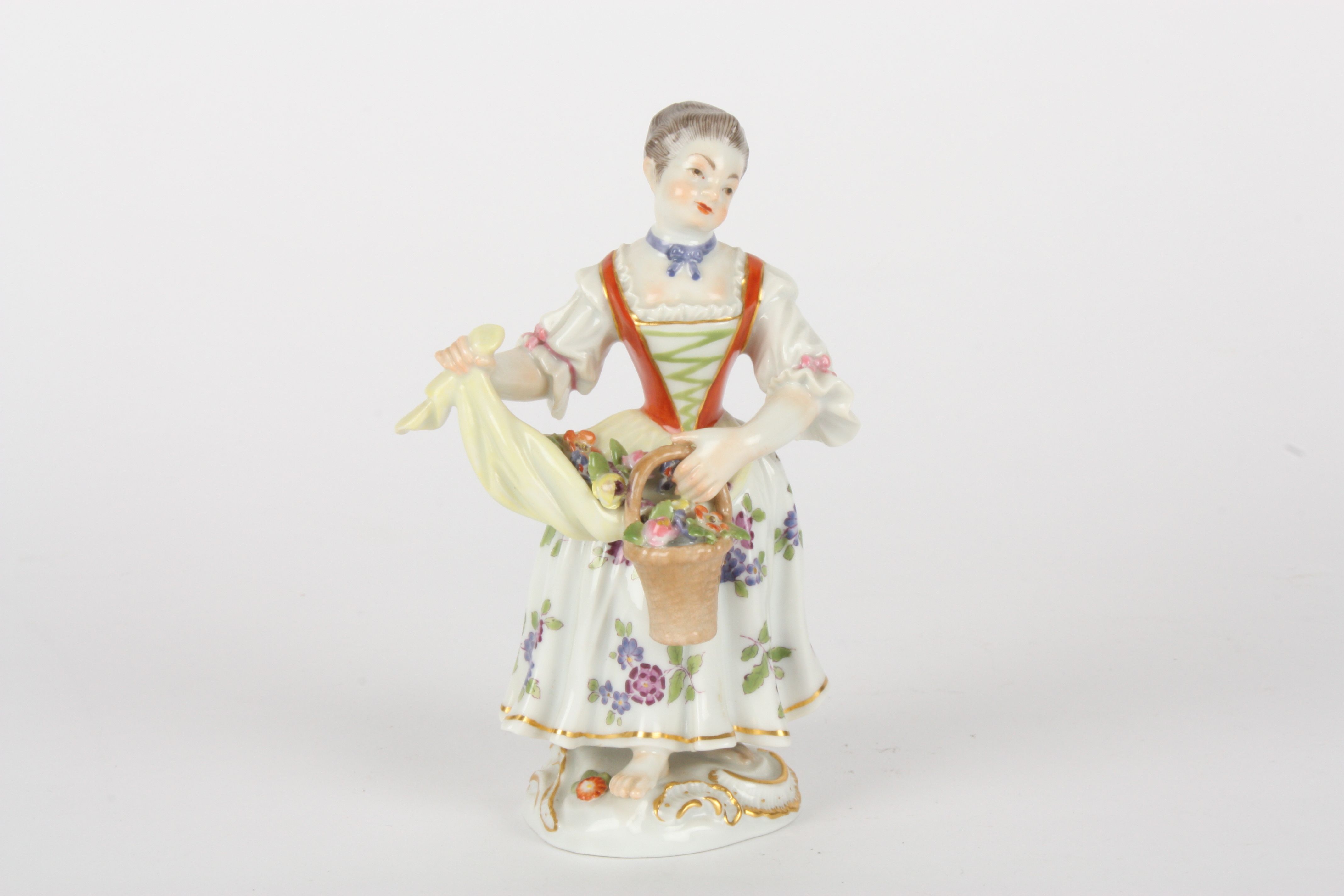 Late 20th century Meissen figure of a gardening girl, after Kaendler, modelled standing holding a