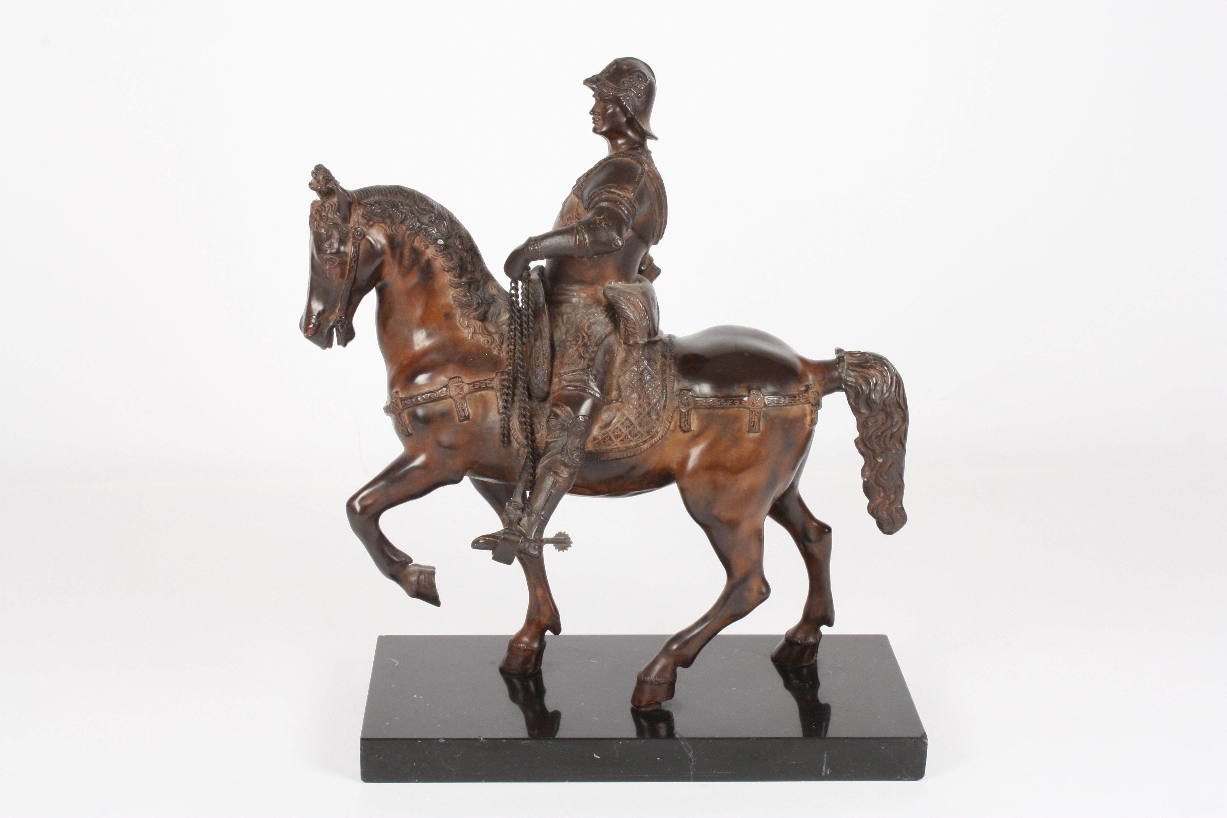 A 20th century bronze horse
the heavily cast sculpture depicting a warrior on a horse wearing - Image 5 of 5