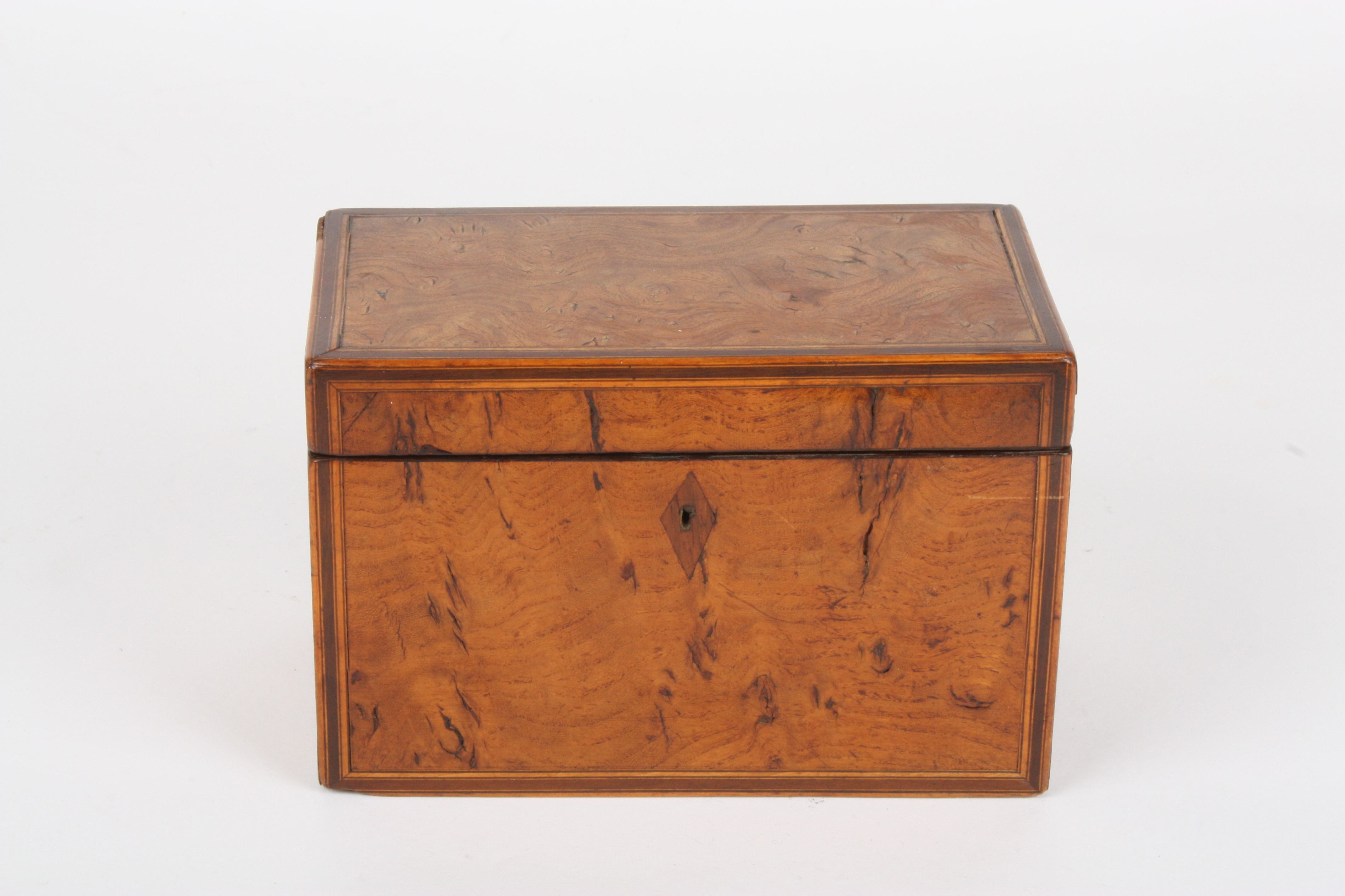 A late 19th century walnut tea caddy
of rectangular form, with two lids to interior, width 8.