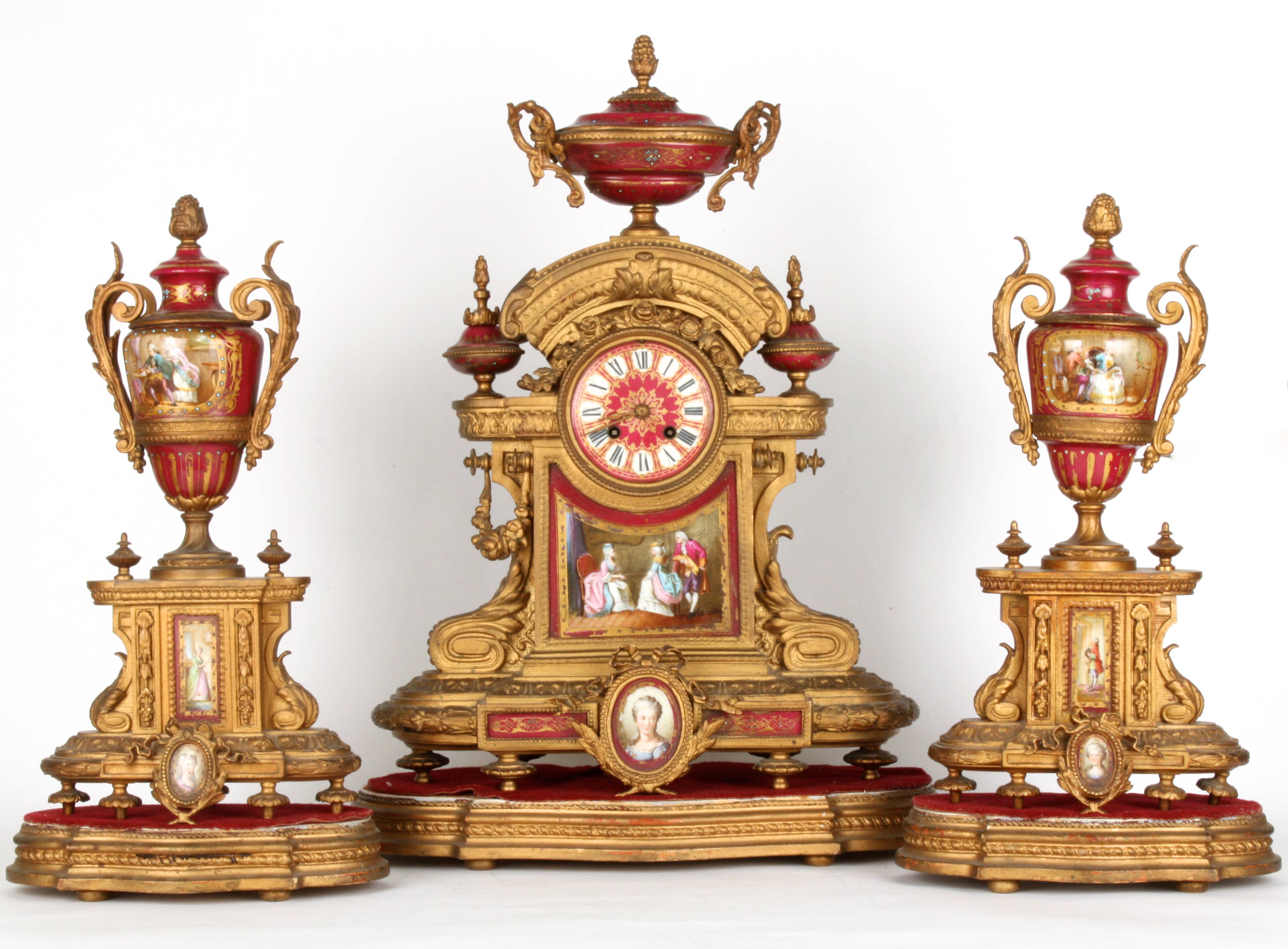 A large late 19th century French gilt painted metal and porcelain clock garniture
the clock with - Image 2 of 3