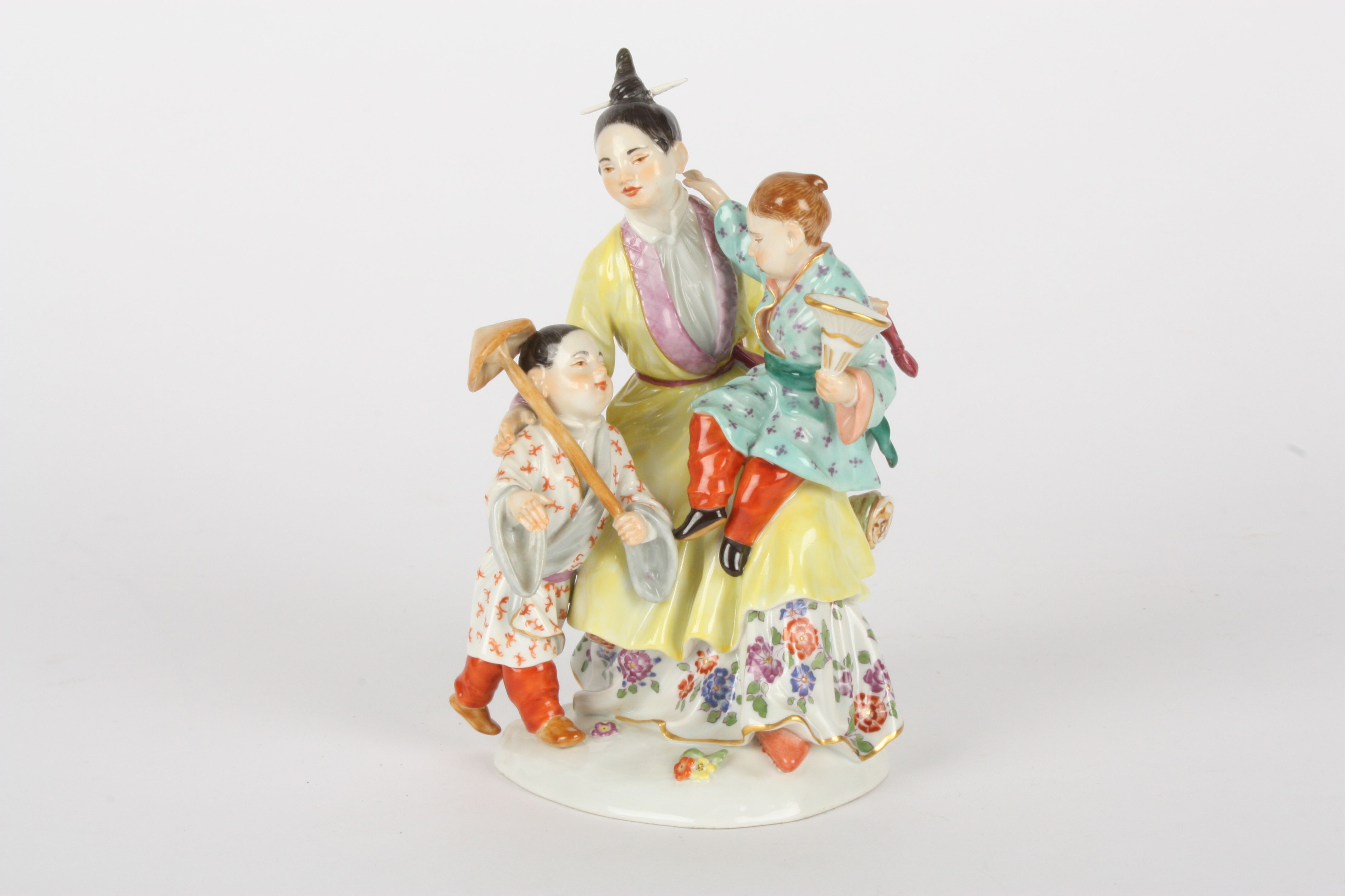 Late 20th century Meissen figure, after Kaendler, modelled as a Japanese lady with two children, the