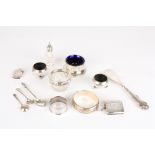 A small collection of assorted silver items
including two salts, a pair of salts, two vesta cases, a