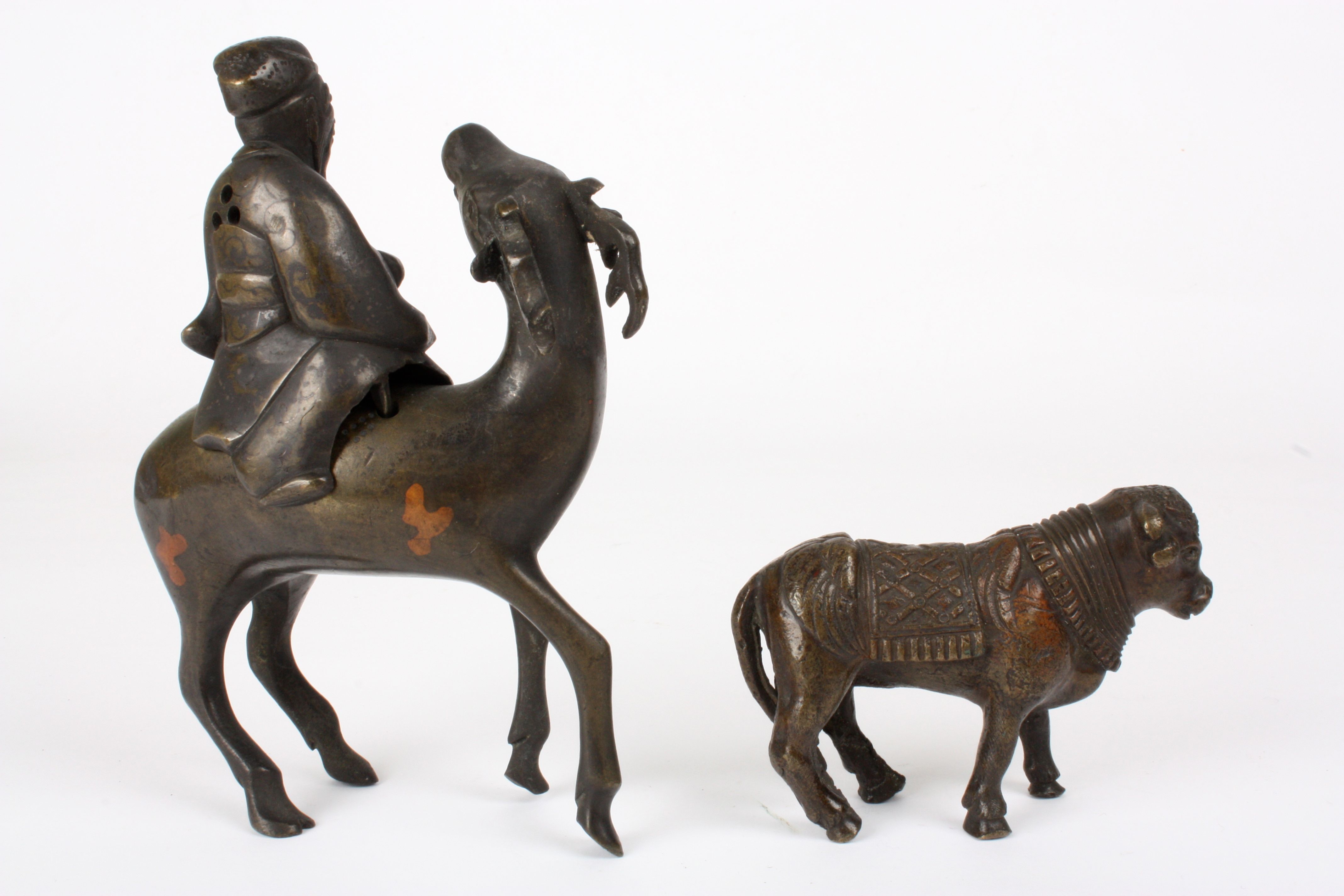 A 19th century Chinese bronze animal incense burner
formed as a sage riding a deer, together with - Image 2 of 3