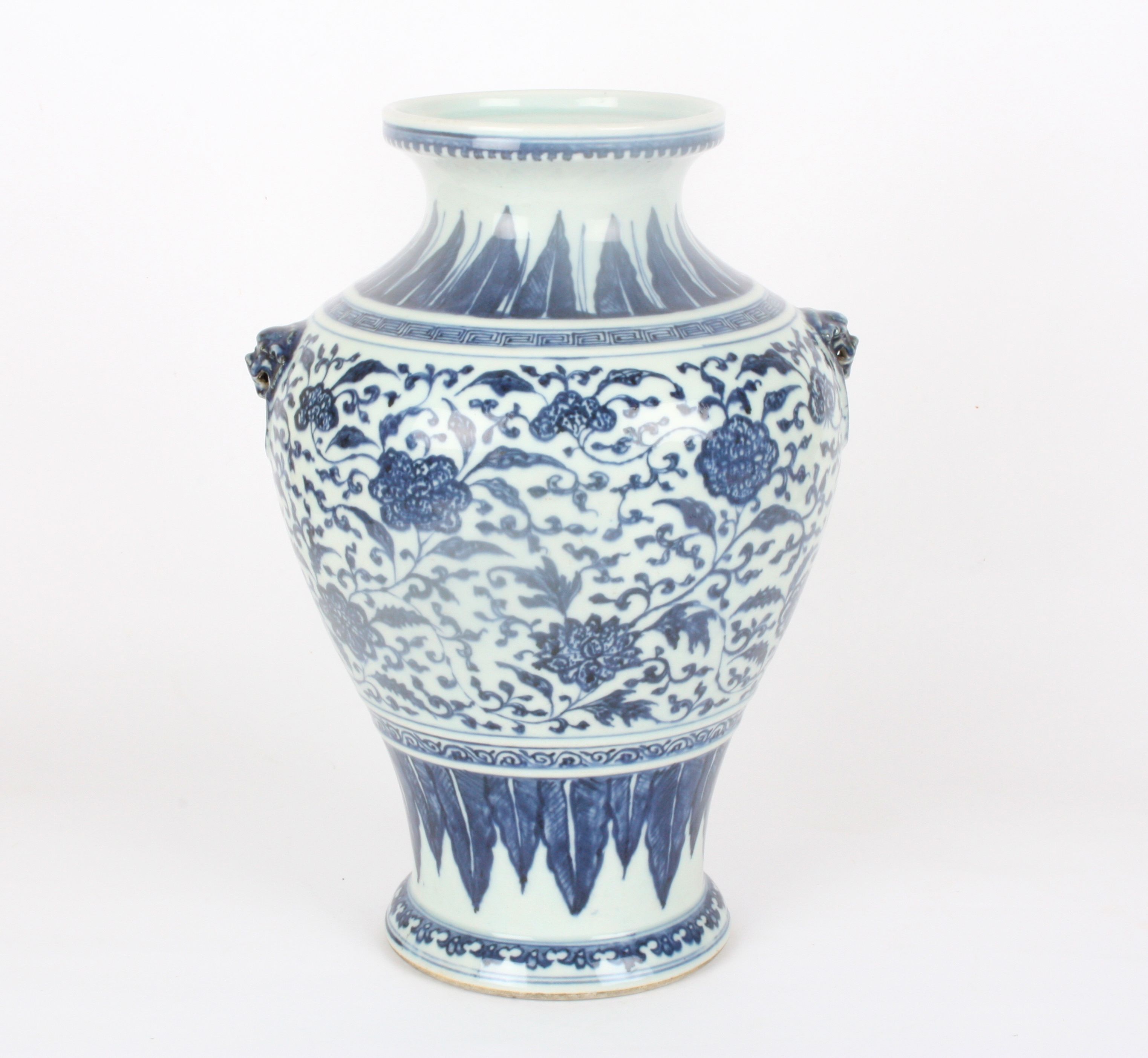 A large late 19th century Chinese blue and white jar
of inverted baluster form, the neck decorated
