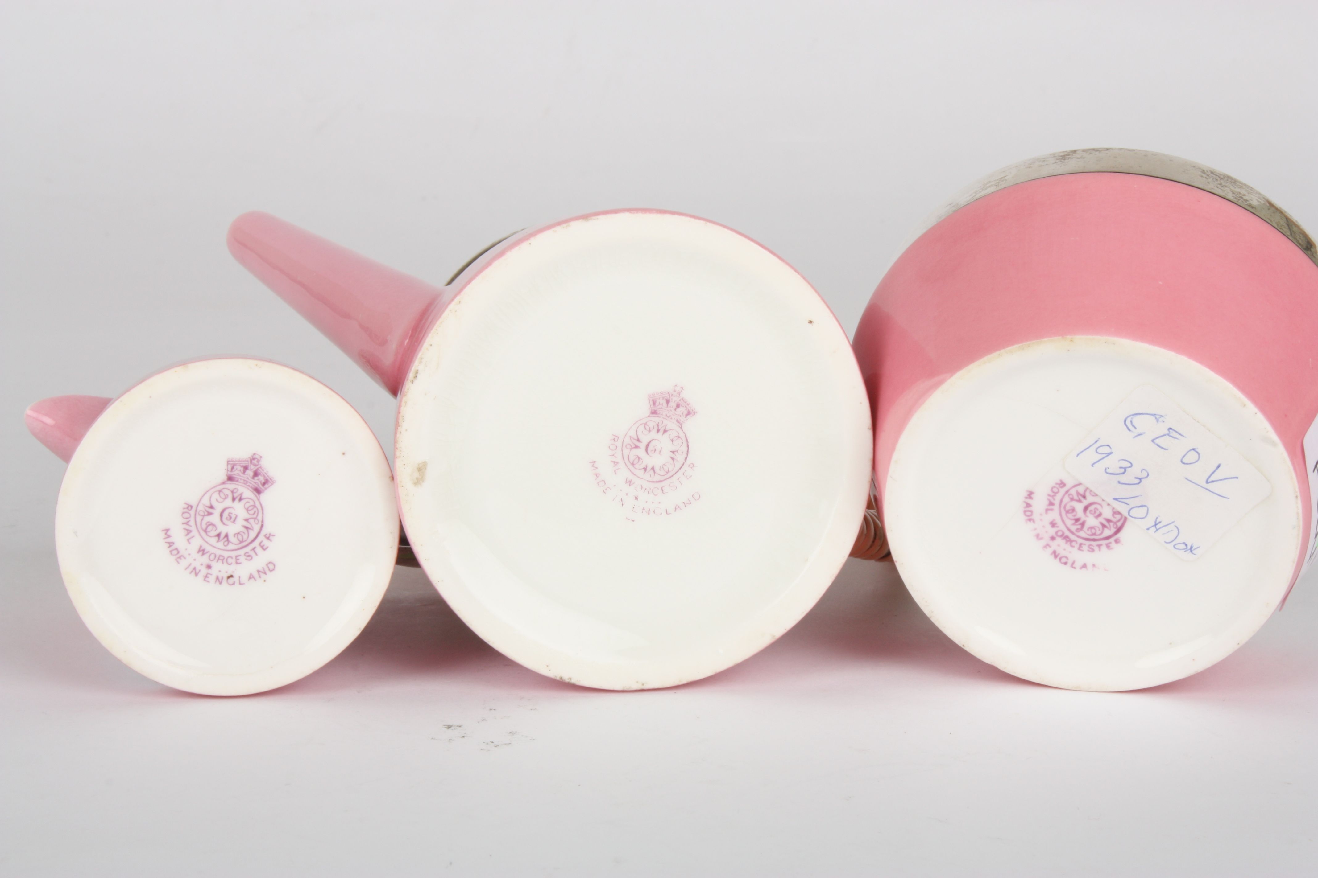 A Royal Worcester pink glazed and silver mounted 'tea for one' set
comprising teapot, milk jug and - Image 2 of 2